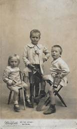 A group of children posing for a picture

Description automatically generated