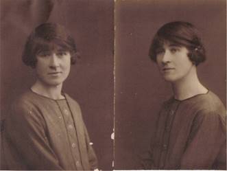 A couple of women posing for a picture

Description automatically generated