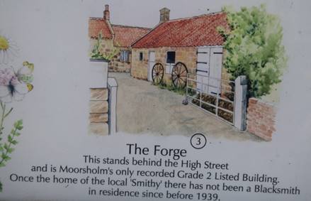 A sign with a drawing of a house

Description automatically generated