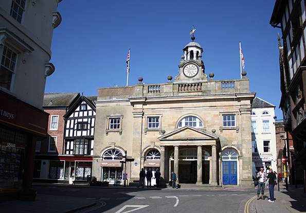 A building with a clock on top
AI-generated content may be incorrect.