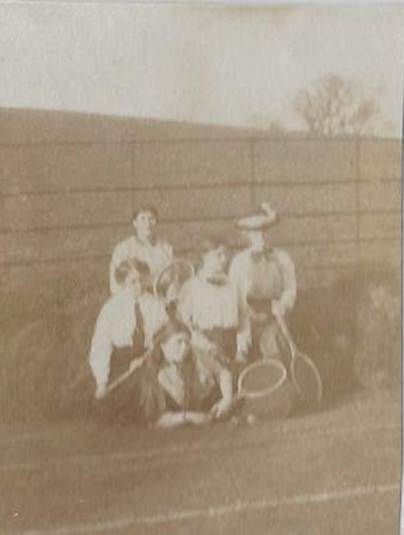 A group of people in a photo album
Description automatically generated