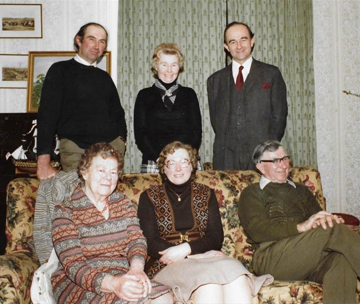 A group of people in a room
Description automatically generated