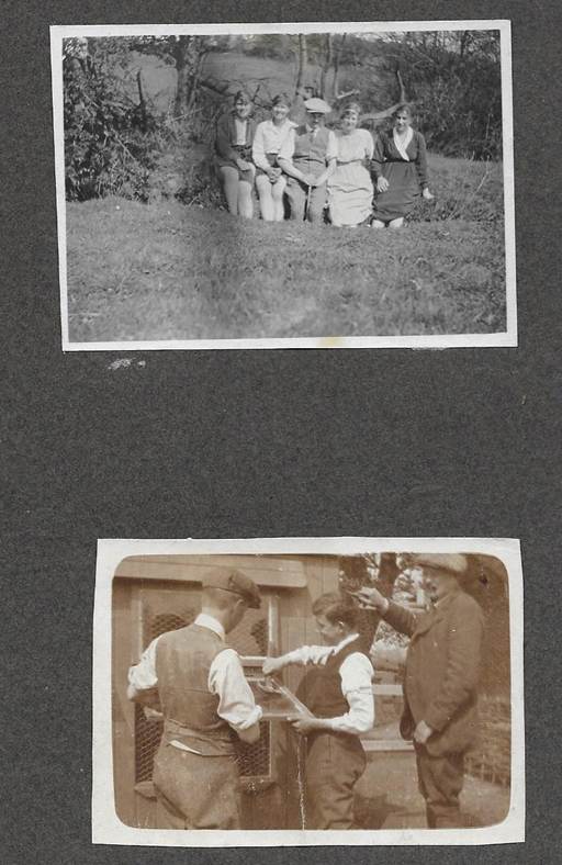 A black and white photo of a group of men
Description automatically generated
