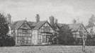 A large house with a large chimney

AI-generated content may be incorrect.