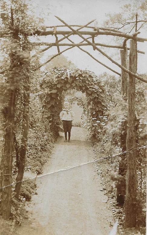 A person standing on a path

Description automatically generated