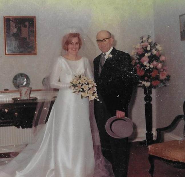 A person and person in wedding attire
Description automatically generated
