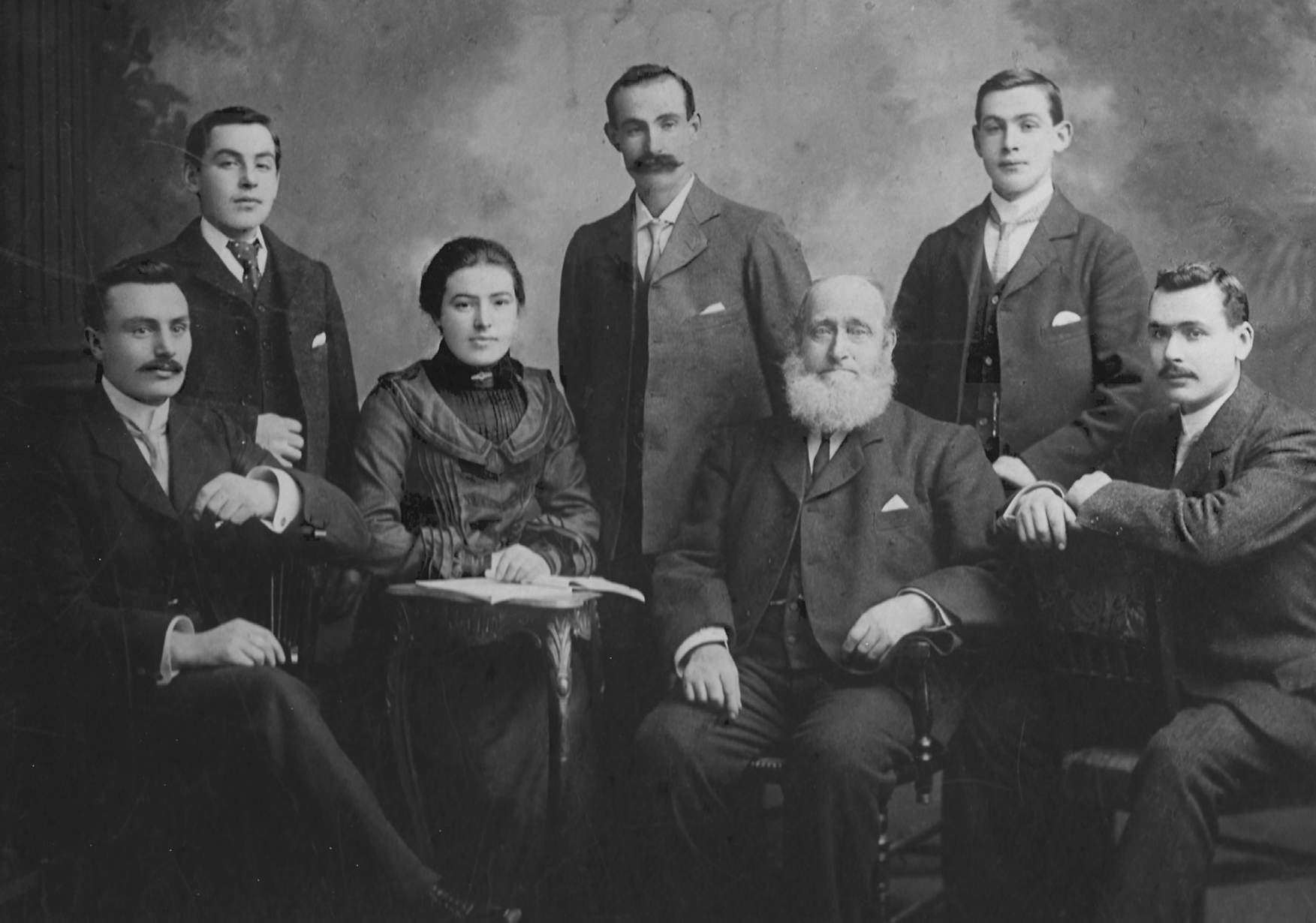 A group of men posing for a photo

AI-generated content may be incorrect.