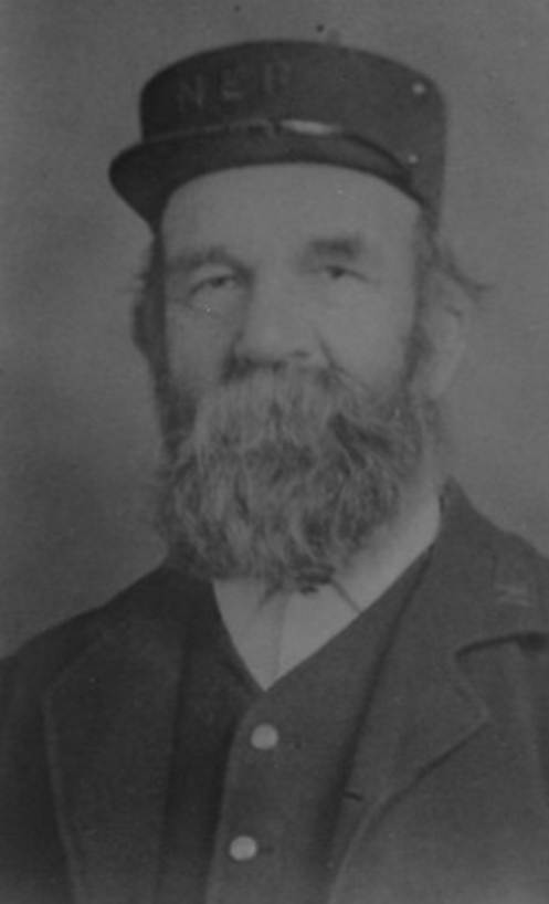 A person in a uniform
Description automatically generated