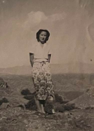 A picture containing text, outdoor, field, old
Description automatically generated