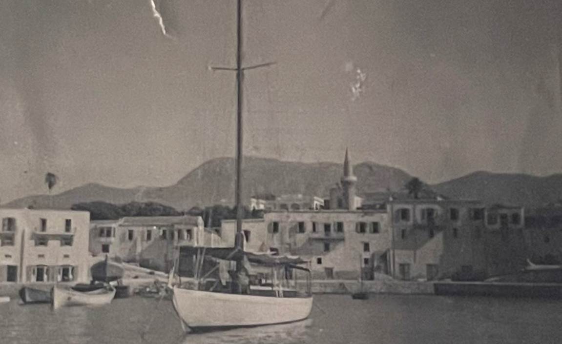 A picture containing outdoor, boat, old, transport
Description automatically generated