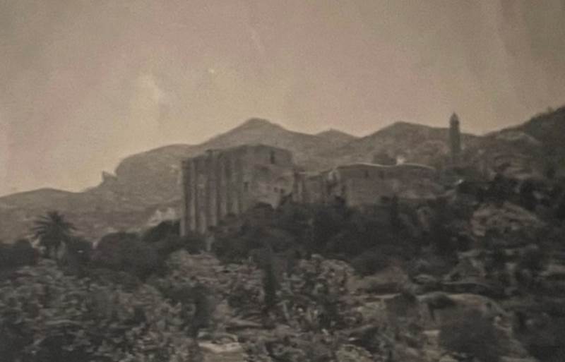 A picture containing mountain, outdoor, nature, old
Description automatically generated