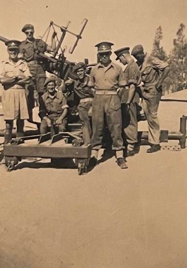 A picture containing text, military vehicle, old, outdoor

Description automatically generated