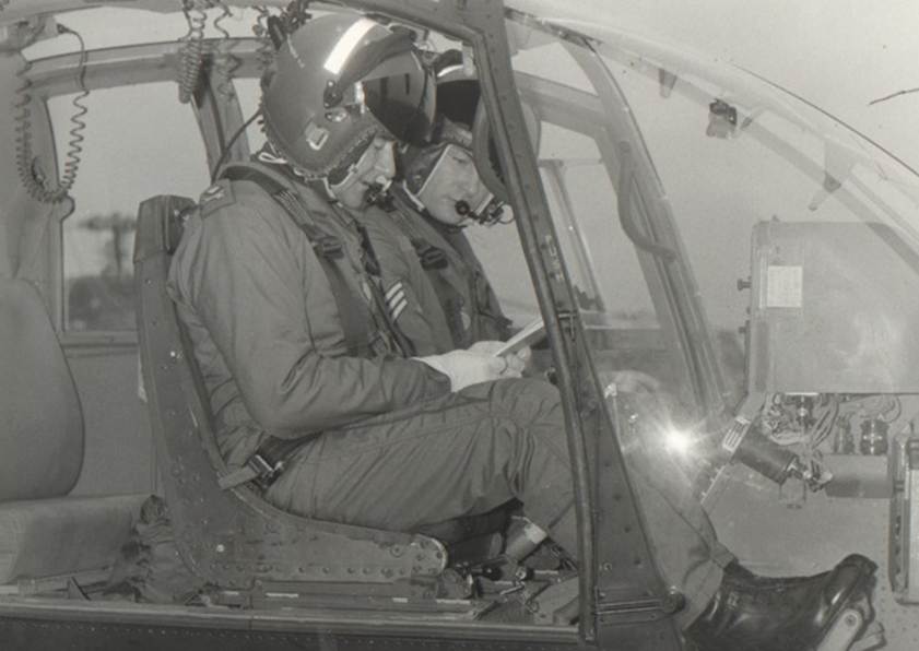 A few pilots in a helicopter
AI-generated content may be incorrect.