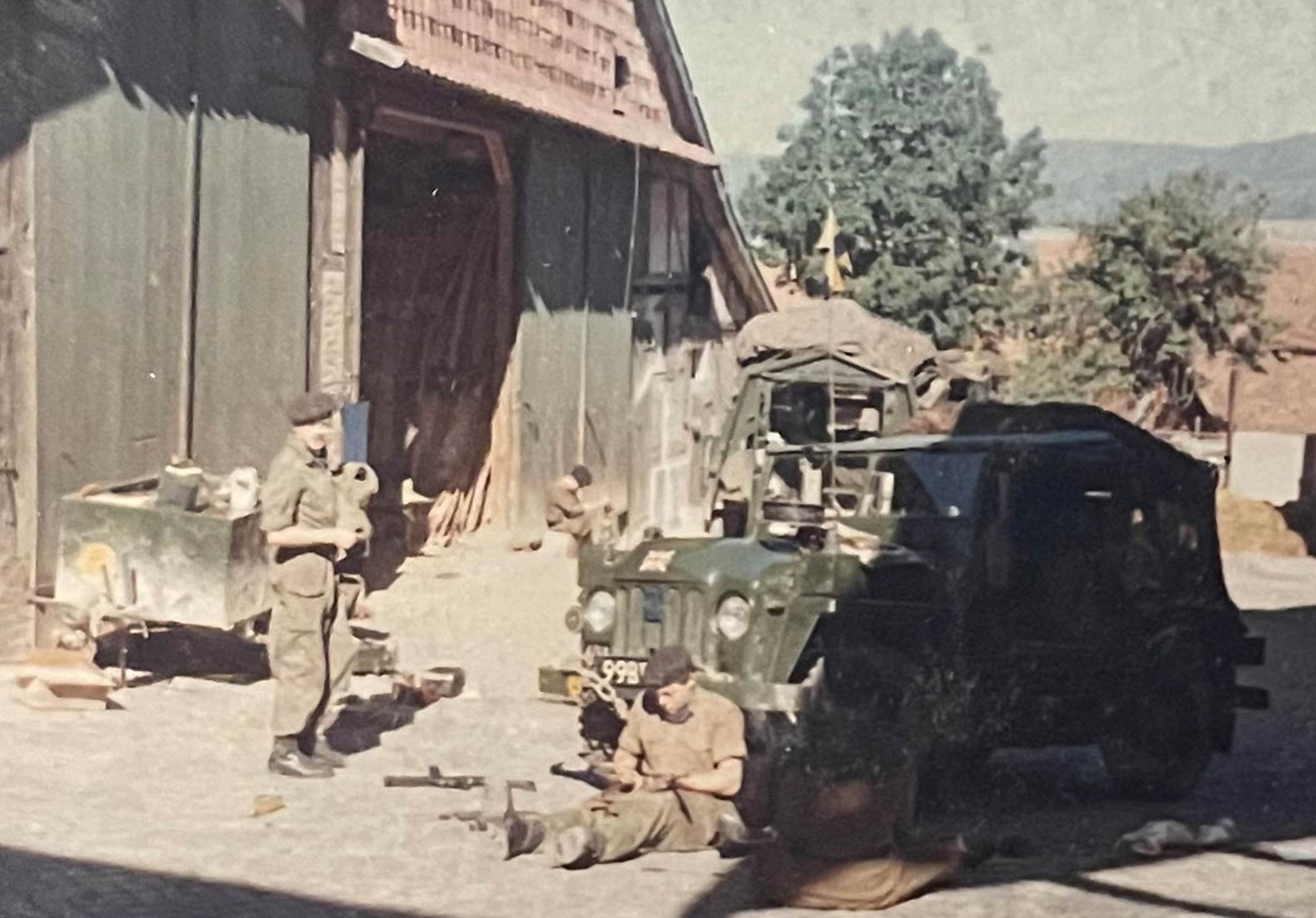 A picture containing outdoor, transport, military vehicle, old
Description automatically generated
