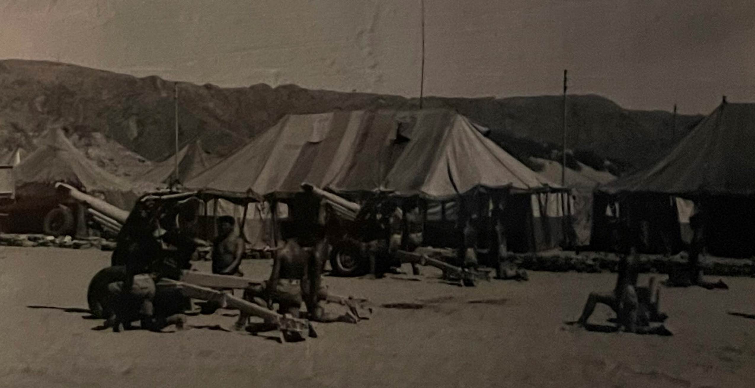 A picture containing outdoor, old, tent, outdoor object
Description automatically generated