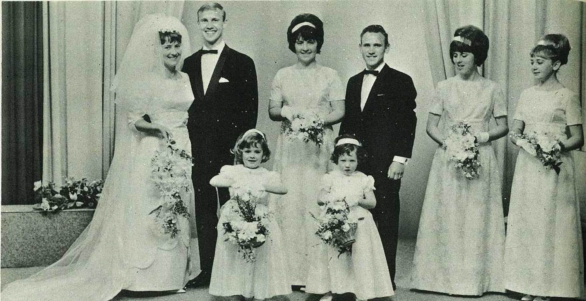 A group of people posing for a photo
Description automatically generated