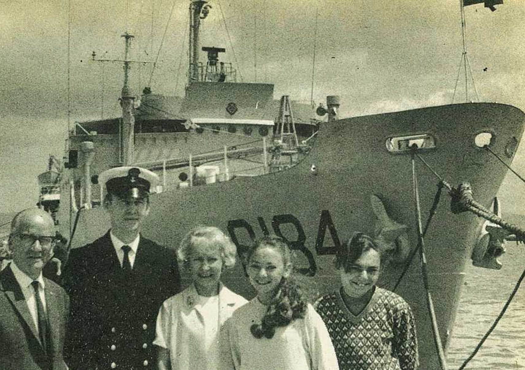 A group of people posing for a photo
Description automatically generated