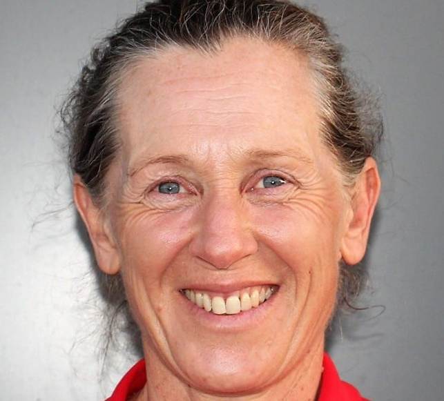 A close-up of a person smiling

AI-generated content may be incorrect.