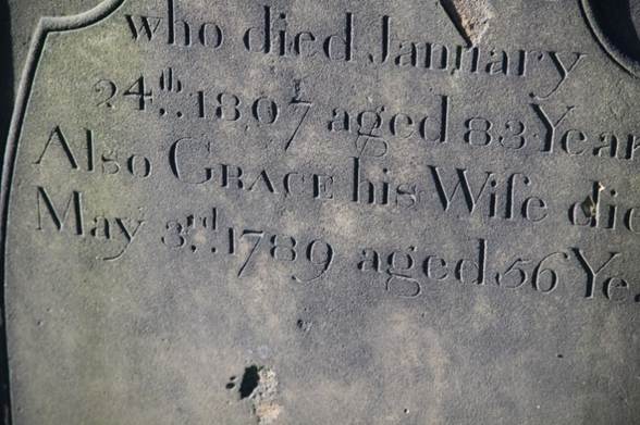 Close-up of a grave stone
Description automatically generated