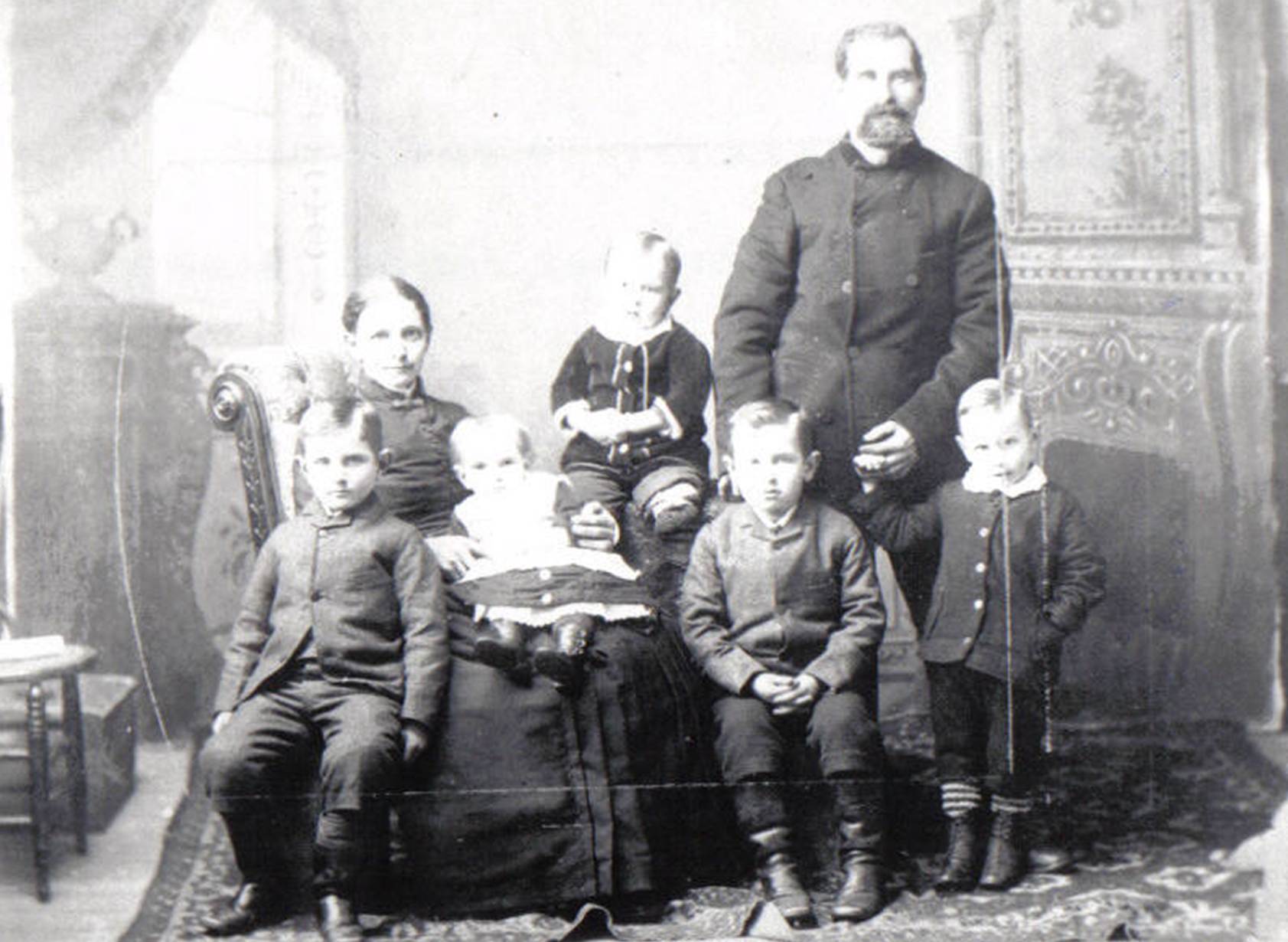 A group of people posing for a photo
Description automatically generated