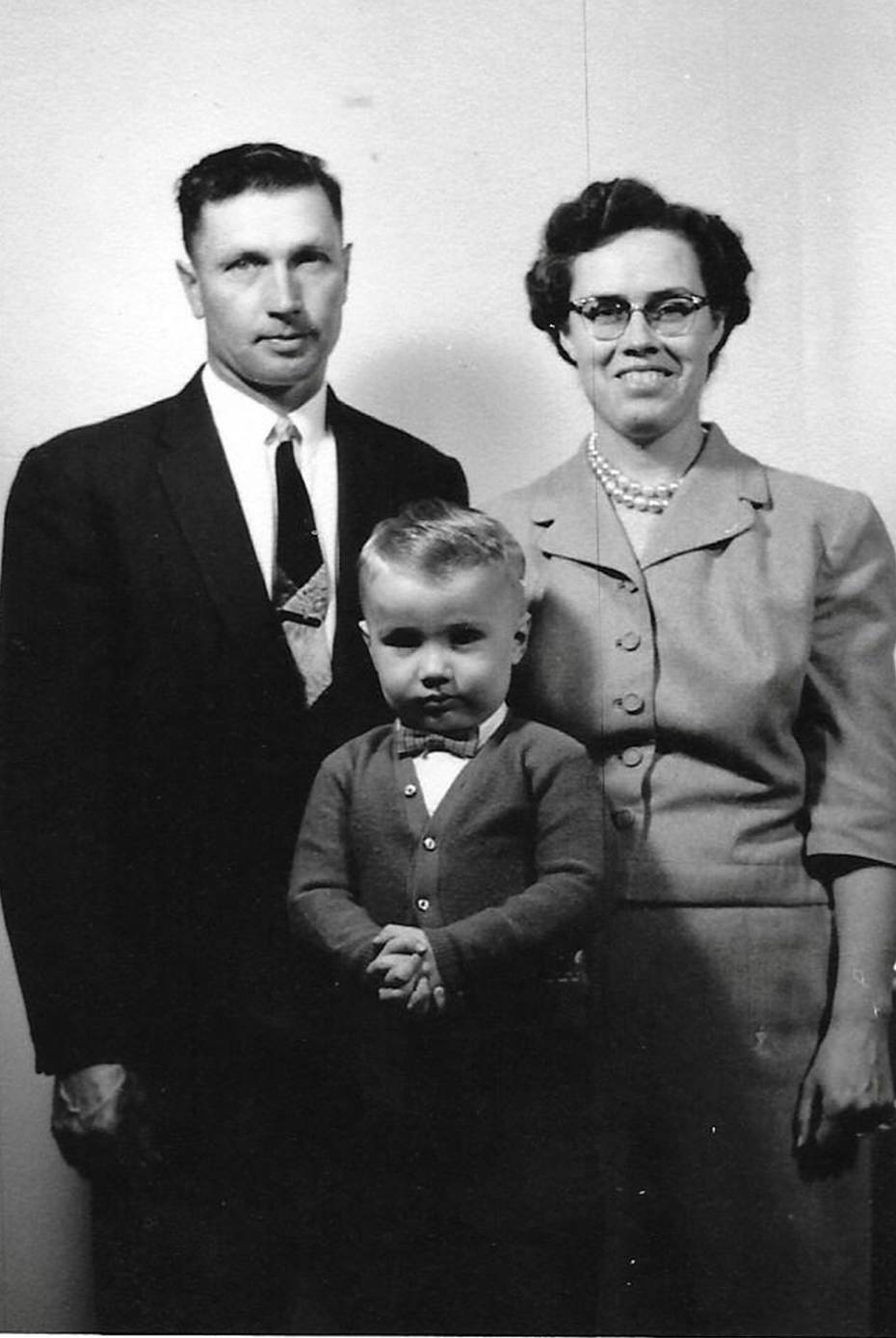 An old photo of a person
Description automatically generated