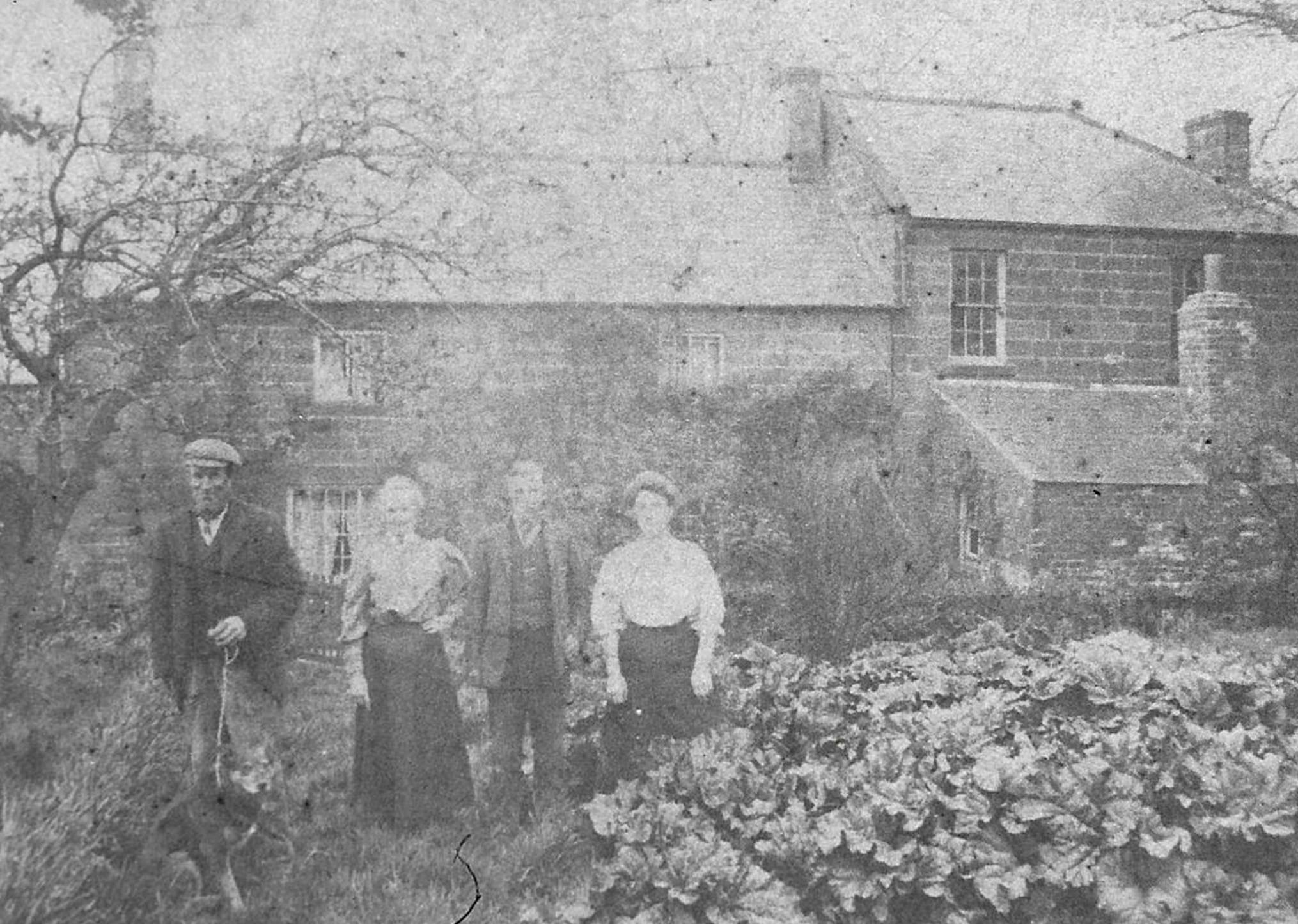 An old photo of a person
Description automatically generated
