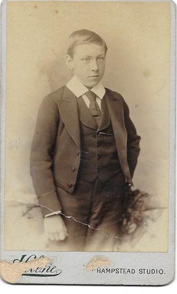 A young person in a suit

Description automatically generated