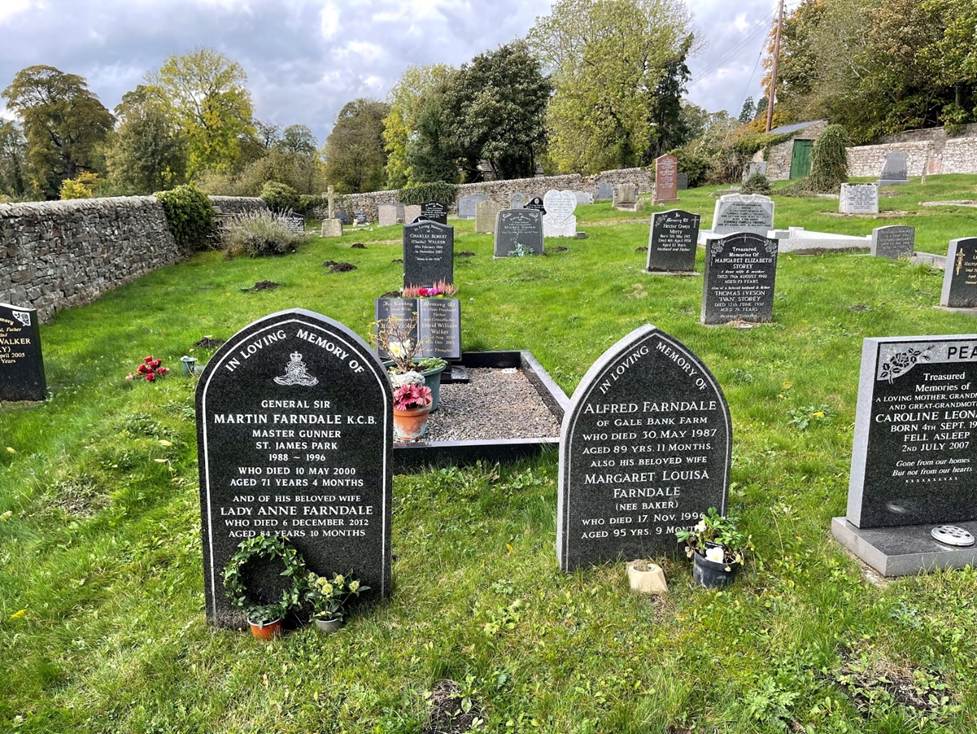 A cemetery with many gravestones
Description automatically generated with low confidence