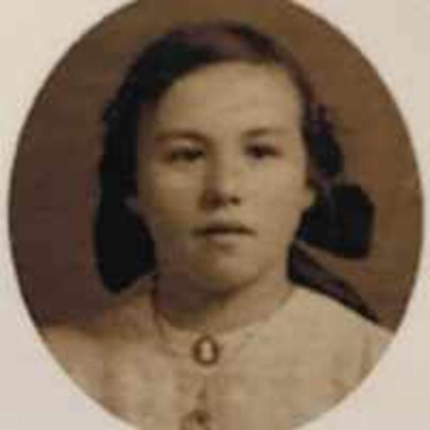 A close-up of a young person
Description automatically generated