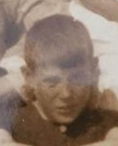 A family photo of a person and person and children
Description automatically generated
