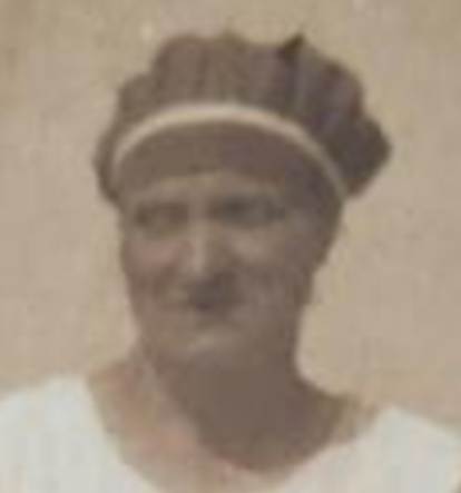 A family photo of a person and person and children
Description automatically generated