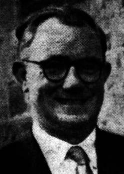 A person wearing glasses and a suit

AI-generated content may be incorrect.