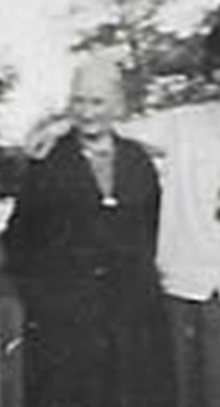 A black and white photo of a person walking by a fence

AI-generated content may be incorrect.