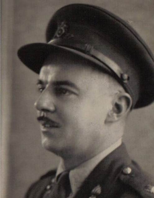A person in a military uniform

Description automatically generated