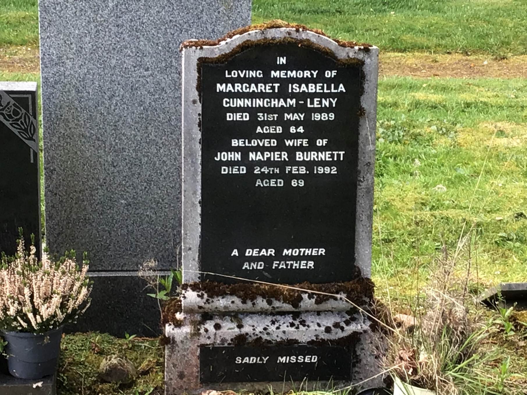 A grave stone with text on it
AI-generated content may be incorrect.