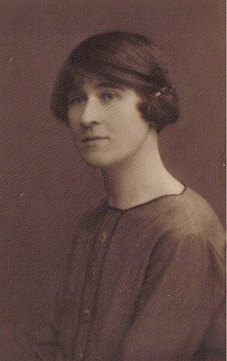 A couple of women posing for a picture

Description automatically generated