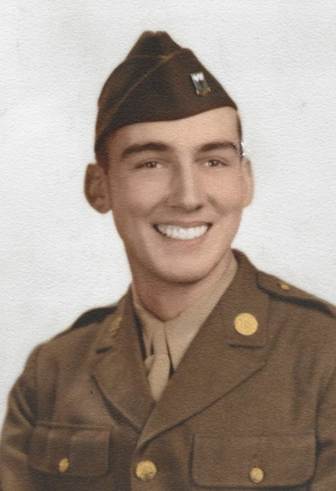 An old photo of a person
Description automatically generated
