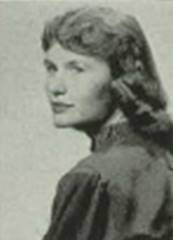 A person with long hair
Description automatically generated