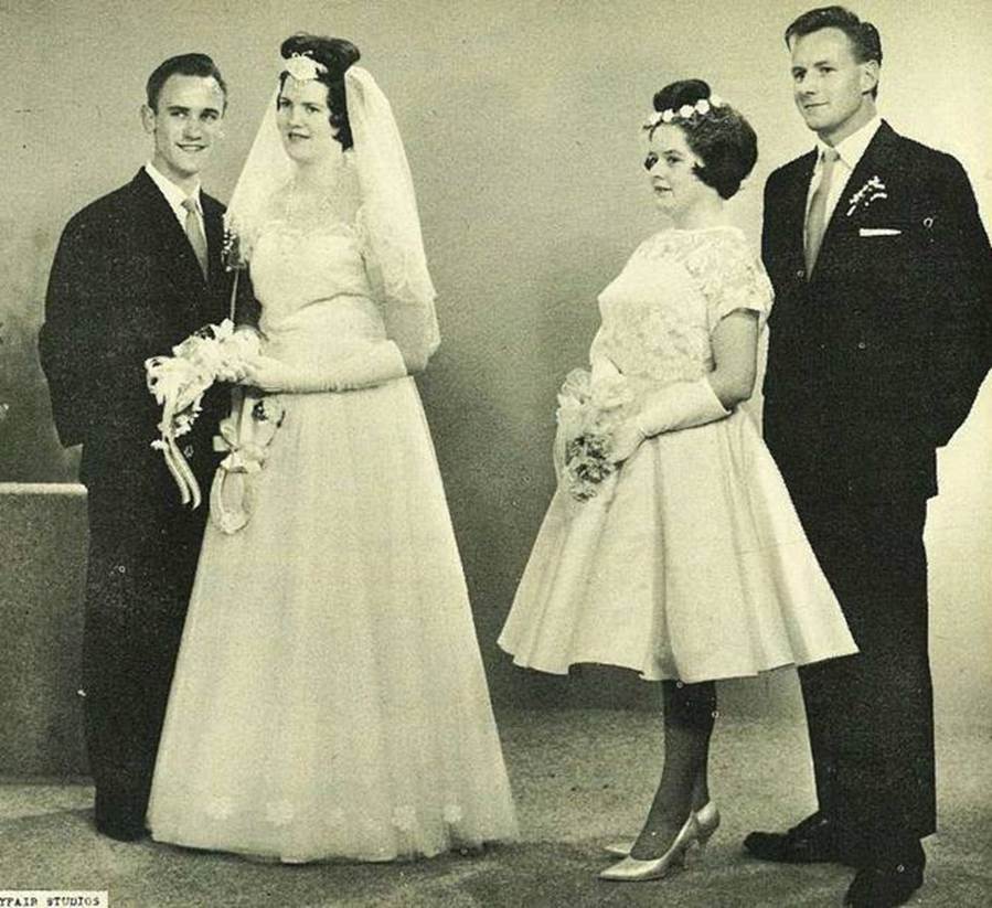 A group of people posing for a photo
Description automatically generated
