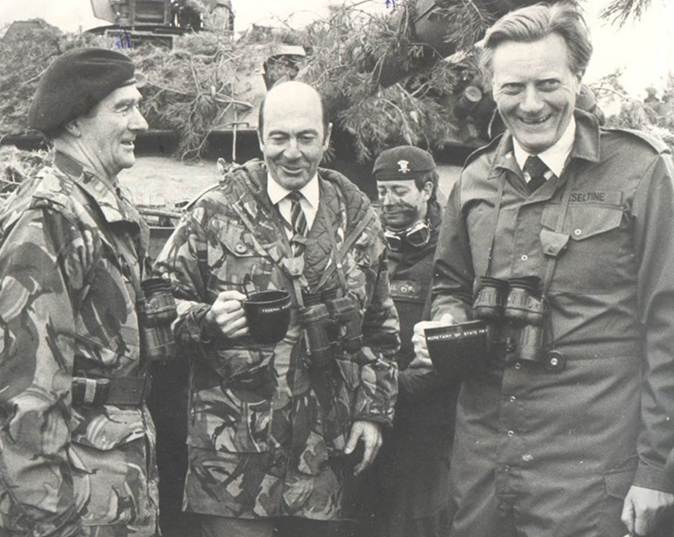 A group of men in military uniforms
Description automatically generated
