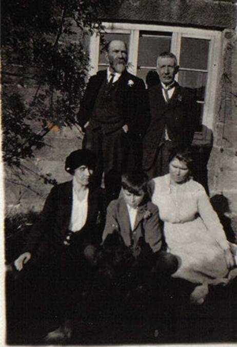 A group of people posing for a photo
Description automatically generated