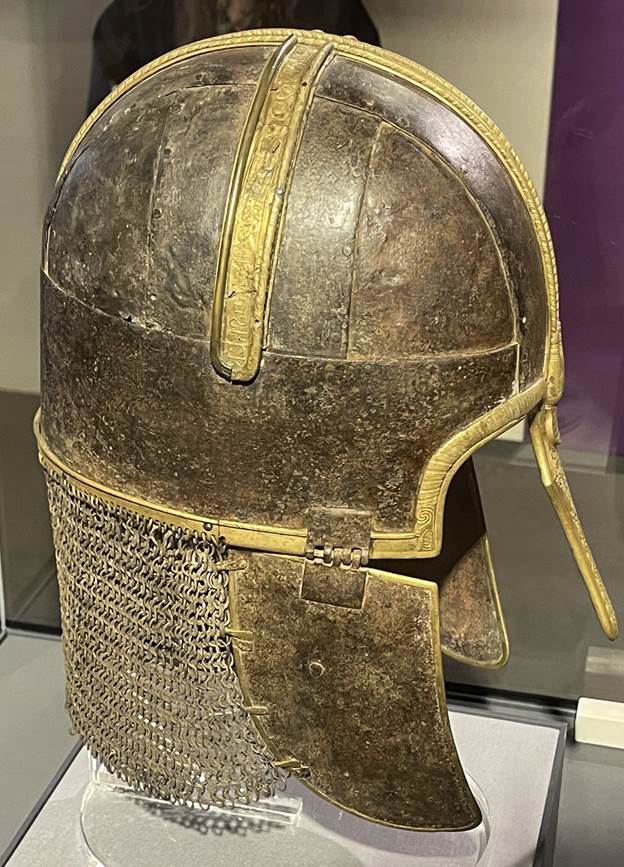 A helmet on a display
Description automatically generated