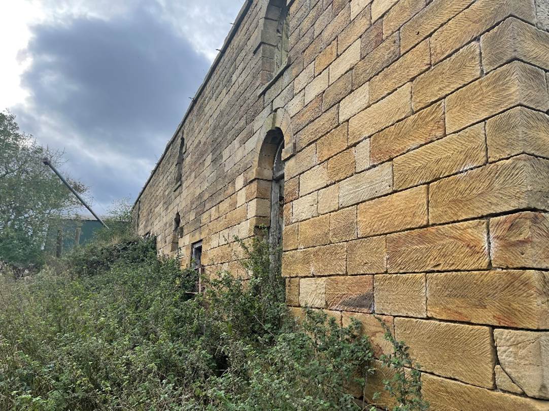 A picture containing outdoor, brick, stone
Description automatically generated