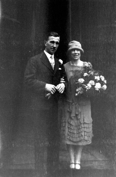 A person and person posing for a picture
Description automatically generated