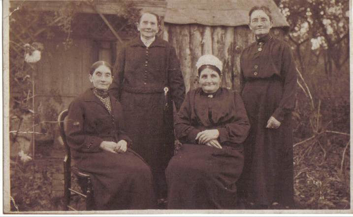 A group of people posing for a photo
Description automatically generated