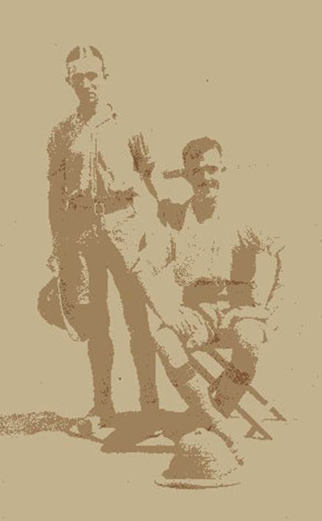 A couple of men posing for a picture
Description automatically generated
