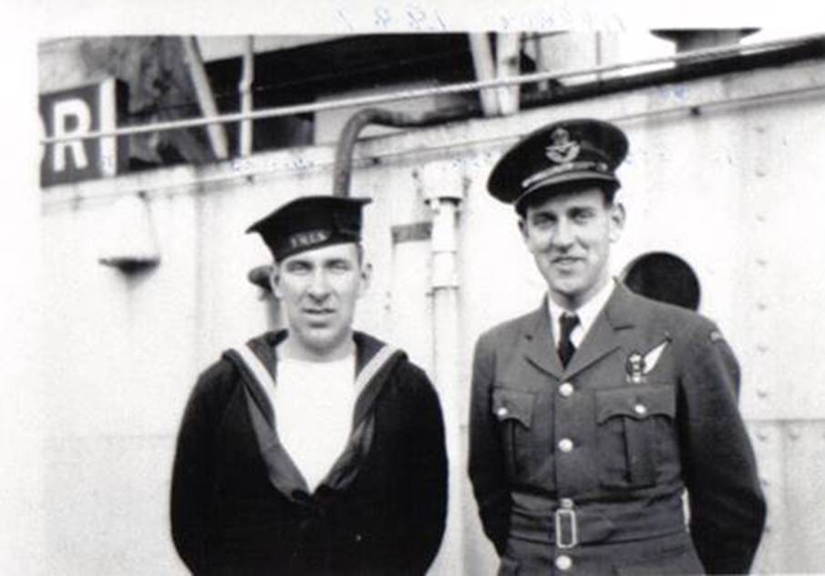 A couple of men in military uniforms
Description automatically generated