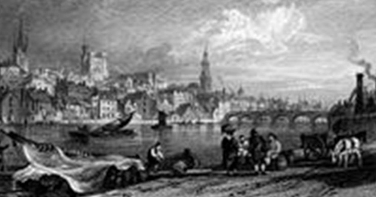 A black and white picture of a city
Description automatically generated